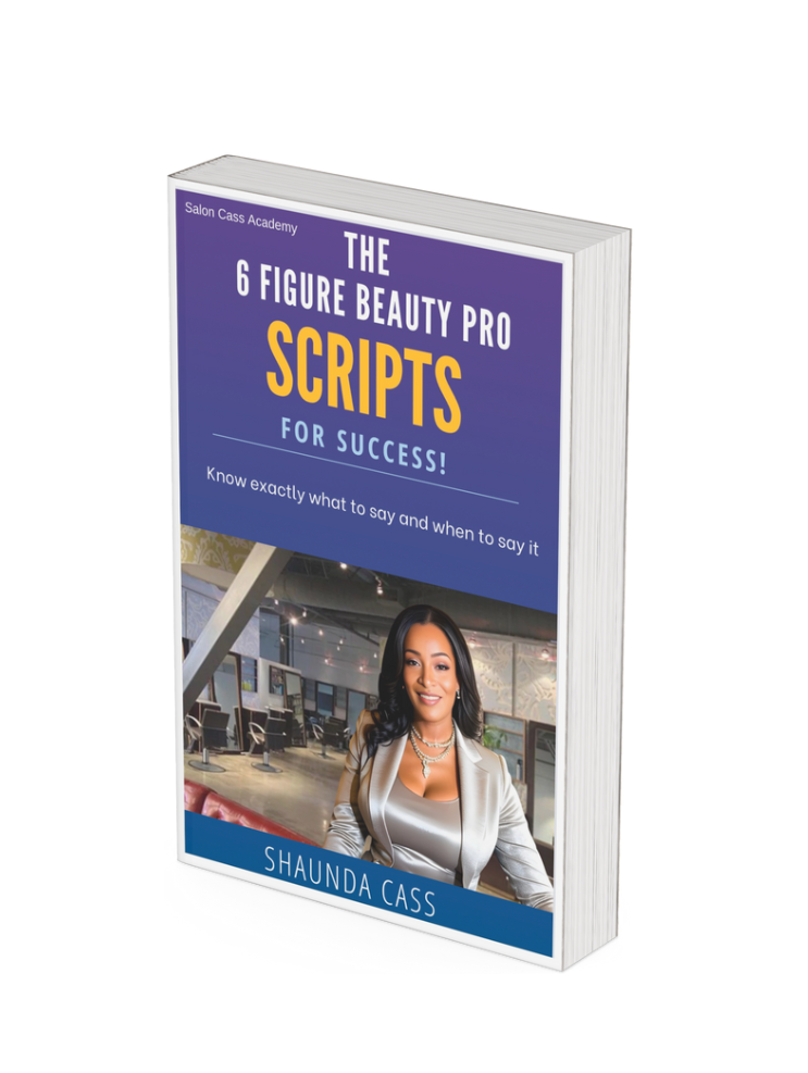 A book cover for 'The 6 Figure Beauty Pro Scripts for Success' by Shaunda Cass, featuring a woman in a professional setting, presumably the author.